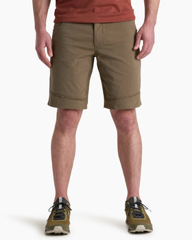 Person wearing brown shorts on a white background