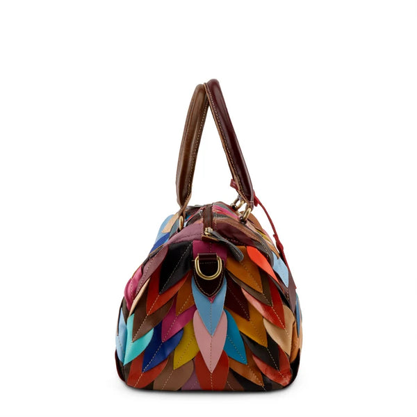 Multicolored handbag with a white background