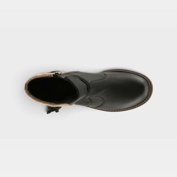 A top-down view of a black leather ankle boot with a tan shearling lining, shown against a light gray background.