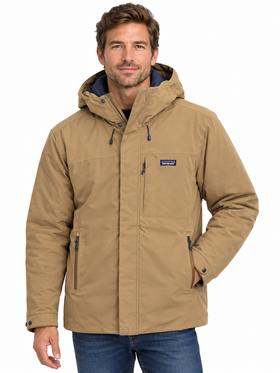 A man wearing a tan Patagonia hooded jacket with blue zipper accents and a small Patagonia logo patch on the chest, paired with blue jeans, against a plain white background.