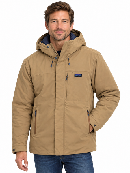 A man wearing a tan Patagonia hooded jacket with blue zipper accents and a small Patagonia logo patch on the chest, paired with blue jeans, against a plain white background.